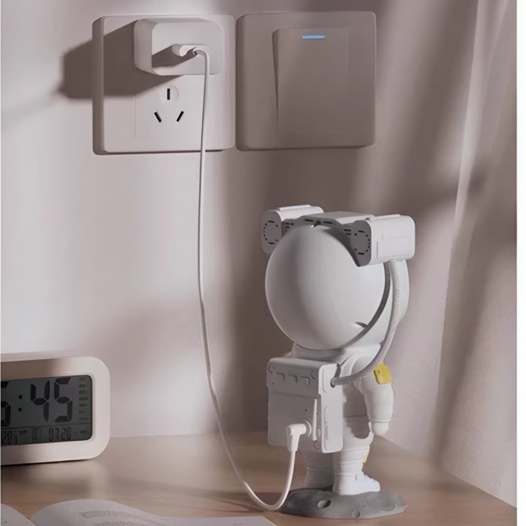 StarSpace™ – Luminária Projetor de Estrelas Astronauta + Caixa de Som Bluetooth